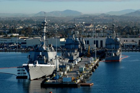 US Navy 051130-N-9866B-008 The guided missile destroyer USS Decatur (DDG 73) and two guided missile cruisers sit moored to their pier on board Naval Station San Diego in Southern California