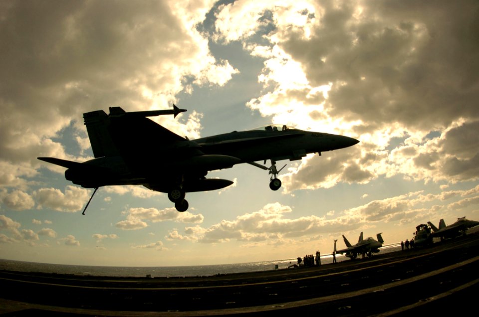 US Navy 051109-N-3488C-117 An F-A-18C Hornet, assigned to the Dambusters of Strike Fighter Squadron One Nine Five (VFA-195), prepares to catch the arresting gear aboard the conventionally powered aircraft carrier USS Kitty Hawk