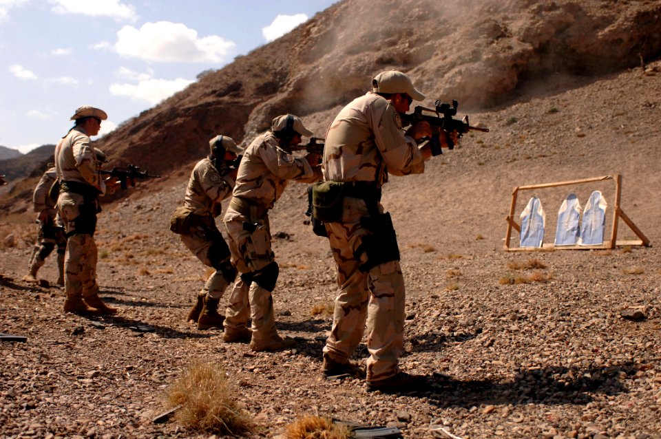 US Navy 051114-F-7234P-102 Members of U.S. Navy Explosive Ordnance Disposal Mobile Unit Eight (EODMU-8), Detachment Four, fire their rifles at Range TC-02, near the village of Arta