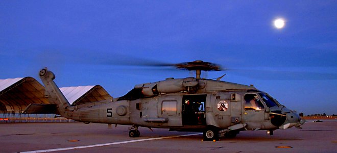 US Navy 051114-N-9500T-046 An HH-60H Seahawk helicopter prepares to takeoff for a night training mission from Naval Air Facility (NAF) El Centro, Calif