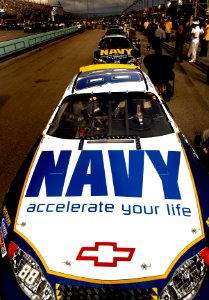 US Navy 051119-N-9769P-218 The NASCAR Busch No. 88 Navy - Accelerate Your life Chevrolet Monte Carlo of the Dale Earnhardt Jr. Racing Team, lines up in front of the No. 14 Navy Accelerate Your Life Dodge Charger photo