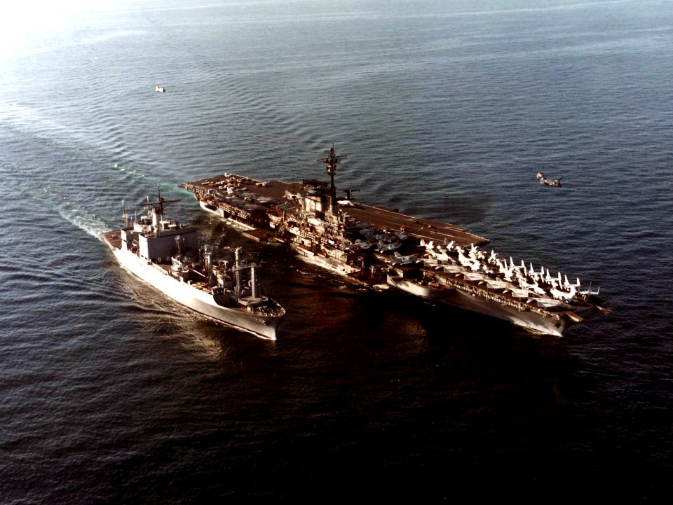 USS Coral Sea (CV-43) with ammunition ship in 1980