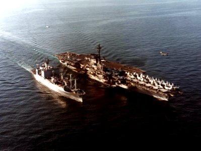USS Coral Sea (CV-43) with ammunition ship in 1980
