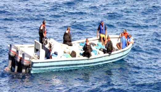 US Navy 051201-N-5858X-001 Sailors intercept a vessel suspected of carrying illegal contraband in the Central Caribbean Sea