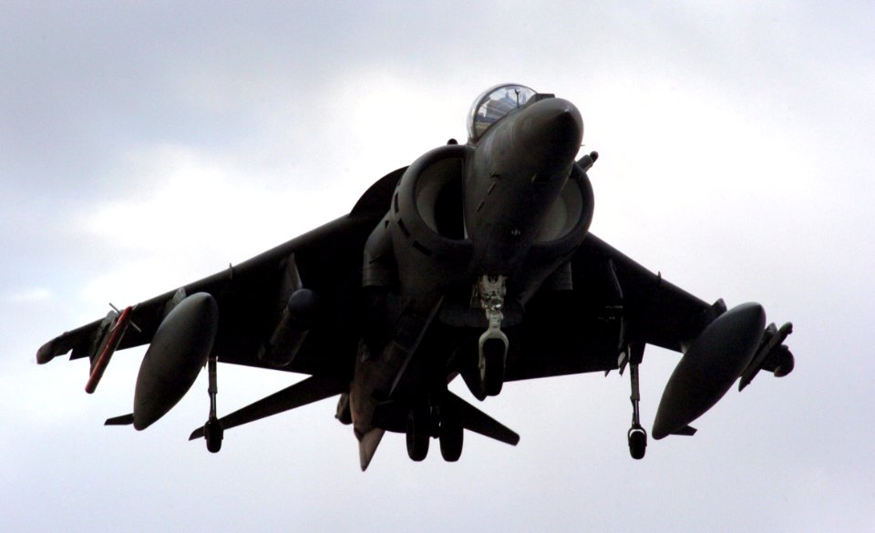 US Navy 051210-N-9866B-067 An AV-8B Harrier, assigned to the Blacksheep of Marine Attack Squadron Two One Four (VMA-214), makes its landing approach to the flight deck of the amphibious assault ship USS Peleliu (LHA 5)