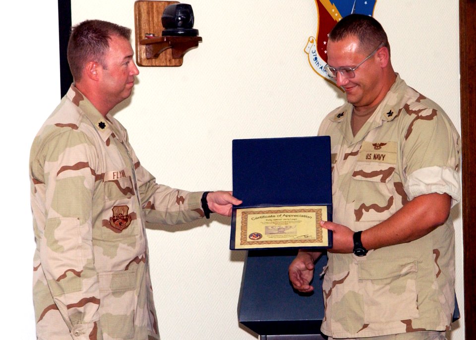 US Navy 051101-F-0000W-001 Deputy Commander, 379th Expeditionary Medical Group, U.S. Air Force Lt. Col. Daniel Flynn