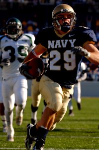 US Navy 051105-N-9693M-009 ) U.S. Naval Academy Midshipman 1st Class Marco Nelson (29) crosses the goal line to score in the 1st quarter of play