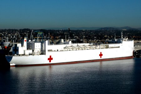 US Navy 051130-N-9866B-007 The Military Sealift Command (MSC) hospital ship USNS Mercy (T-AH 19) sits moored in its homeport of Naval Station San Diego photo