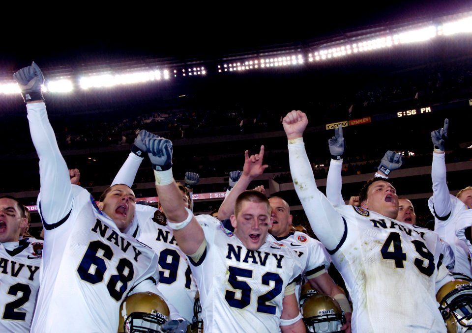 US Navy 051203-G-9409S-052 U.S. Naval Academy Midshipmen celebrate at the conclusion of the 106th Army vs. Navy Football game held for the third consecutive year at Lincoln Financial Field