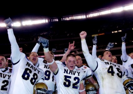 US Navy 051203-G-9409S-052 U.S. Naval Academy Midshipmen celebrate at the conclusion of the 106th Army vs. Navy Football game held for the third consecutive year at Lincoln Financial Field
