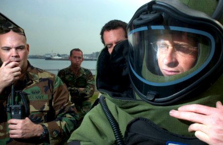 US Navy 051202-N-9851B-005 U.S. Navy Mineman 1st Class Kieth Pierson, assigned to Explosive Ordnance Disposal Mobile Unit Five (EODMU-5), Detachment Japan, has communication equipment attached to his protective bomb suit