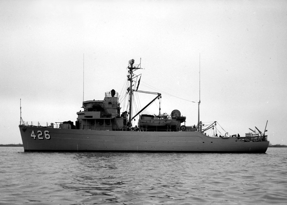 USS Conflict (MSO-426) broadside view in 1954