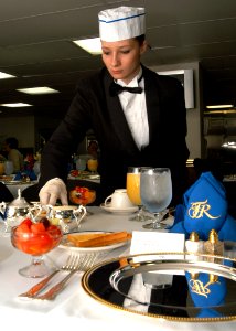 US Navy 060105-N-9805F-503 Culinary Specialist 2nd Class Tiffany Graham, prepares breakfast for the Chief of Naval Operations (CNO), Adm. Mike Mullen aboard the Nimitz-class aircraft carrier USS Theodore Roosevelt (CVN 71)