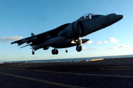 US Navy 051203-N-9866B-141 An AV-8B Harrier prepares to land on the flight deck of the amphibious assault ship USS Peleliu (LHA 5)