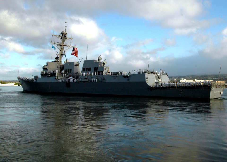 US Navy 060105-N-3019M-006 Sailors man the rails aboard the guided missile destroyer USS Chung-Hoon (DDG 93), as she departs Pearl Harbor