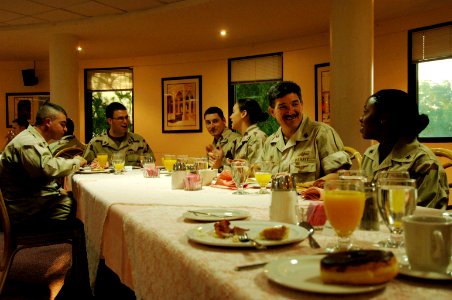 US Navy 060106-N-4374S-003 Master Chief Petty Officer of the Navy (MCPON) Terry Scott speaks with Sailors during a breakfast meeting at U.S. Naval Support Activity Bahrain