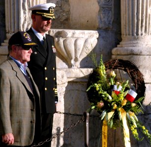 US Navy 060111-N-2736O-002 USS San Antonio Commanding Officer Capt. Jonathan M. Padfield, and Chairman of USS San Antonio Commissioning Committee Tres Kleberg, present a wreath to honor the men who gave their lives at the Alamo