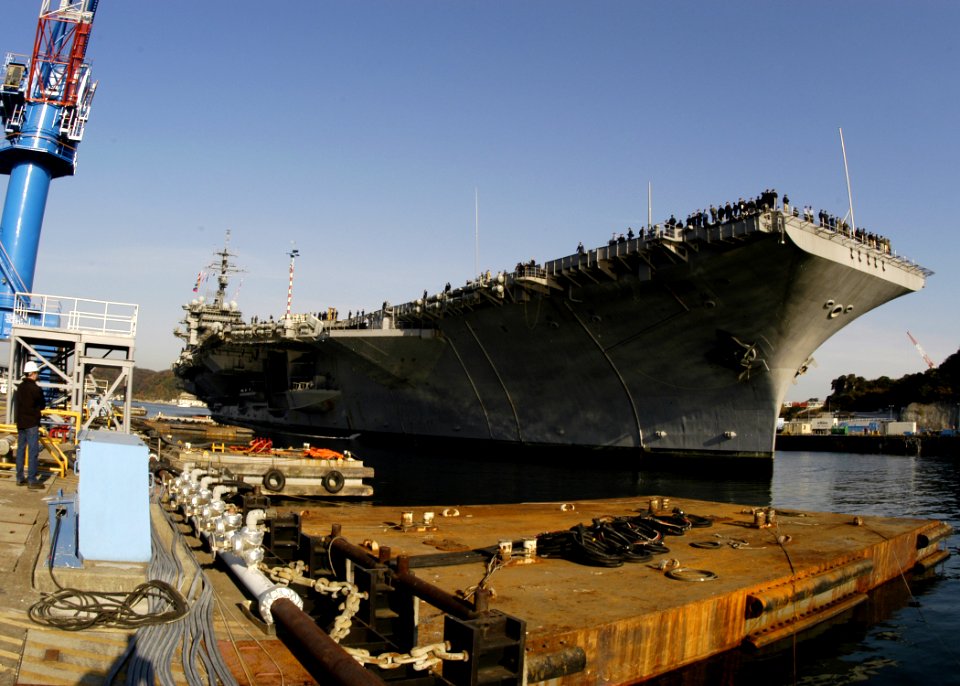 US Navy 051212-N-2385R-008 The conventionally powered aircraft carrier USS Kitty Hawk (CV 63) arrives in her homeport of Commander, Fleet Activities Yokosuka, Japan