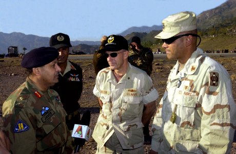 US Navy 051116-F-9927R-004 Pakistani Army Maj. Gen. Jared, left, U.S. Navy Rear Adm. Mike Lefever, center, and U.S. Army Capt. Paul Ireland discuss the newly established forward refueling point photo