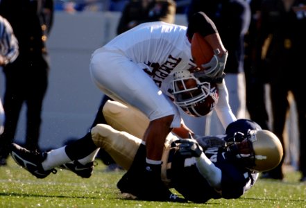US Navy 051119-N-9693M-004 U.S. Naval Academy Midshipman defender Ketric Buffin (11) tackles Temple Owls wide receiver Brian Allbrooks (2) during the 1st quarter of play at Navy-Marine Corps Memorial Stadium