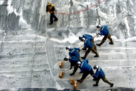 US Navy 051214-N-9866B-002 Sailors assigned to Air Department conduct a Scrub Exercise (SCRUBEX) on the flight deck aboard the amphibious assault ship USS Peleliu (LHA 5) after flight operations