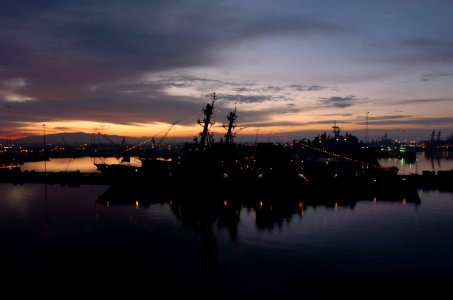 US Navy 060101-N-9866B-300 The guided missile destroyer USS Milius (DDG 69), foreground, and other 3rd Fleet ships home ported at Naval Station San Diego display their holiday lights in celebration moments after the start of th