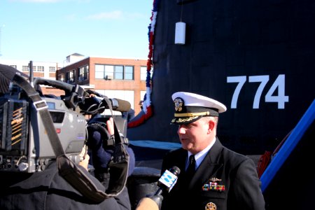US Navy 051123-N-0653J-003 Commanding Officer, USS Virginia (SSN 774), Cmdr. Todd Cramer, answers questions from local media about his submarine