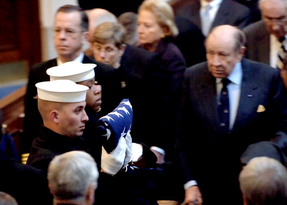US Navy 051214-N-5390M-001 Chief of Naval Operations Adm. Mike Mullen and retired Adm. William Crowe look on as the honor guard leaves the U.S. Naval Academy Chapel during the interment ceremony of retired Vice Adm. William P