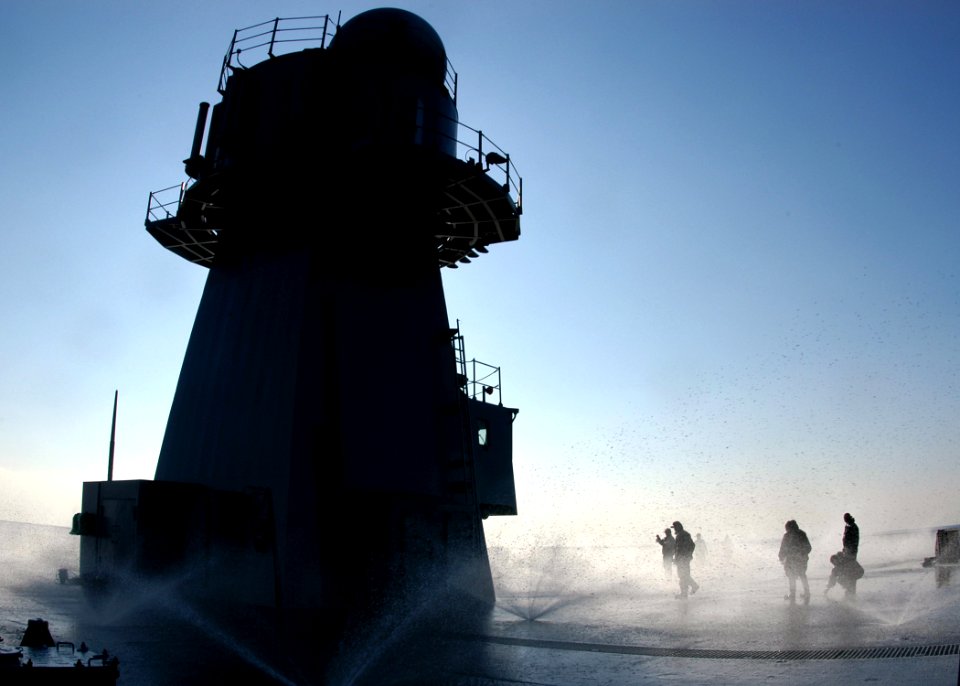 US Navy 051122-N-7526R-052 Sailors aboard the amphibious command ship USS Blue Ridge (LCC 19) check sprinklers during a fresh water countermeasure wash down