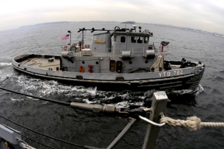 US Navy 060113-N-2385R-049 A Yokosuka Naval tugboat (YTB 782) prepares to assist the guided missile destroyer USS Curtis Wilbur (DDG 54)