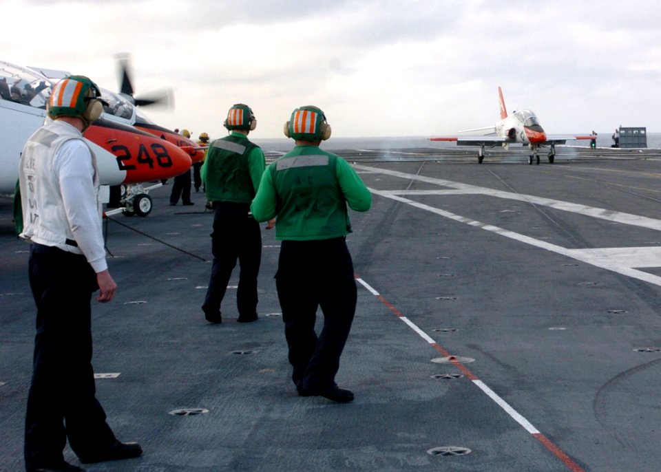 US Navy 060125-N-7359L-003 A T-45C Goshawk, makes an arrested landing aboard the Nimitz-class aircraft carrier USS Dwight D. Eisenhower (CVN 69)
