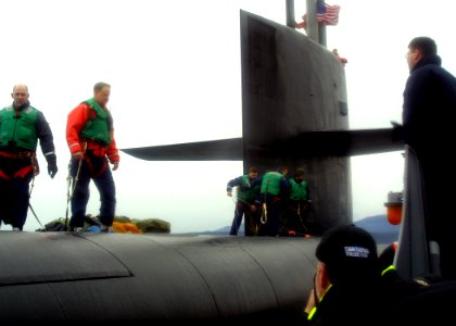 US Navy 060129-N-1464F-007 The guided missile submarine USS Ohio (SSGN 726) prepares for a personnel transfer in Puget Sound, Washington