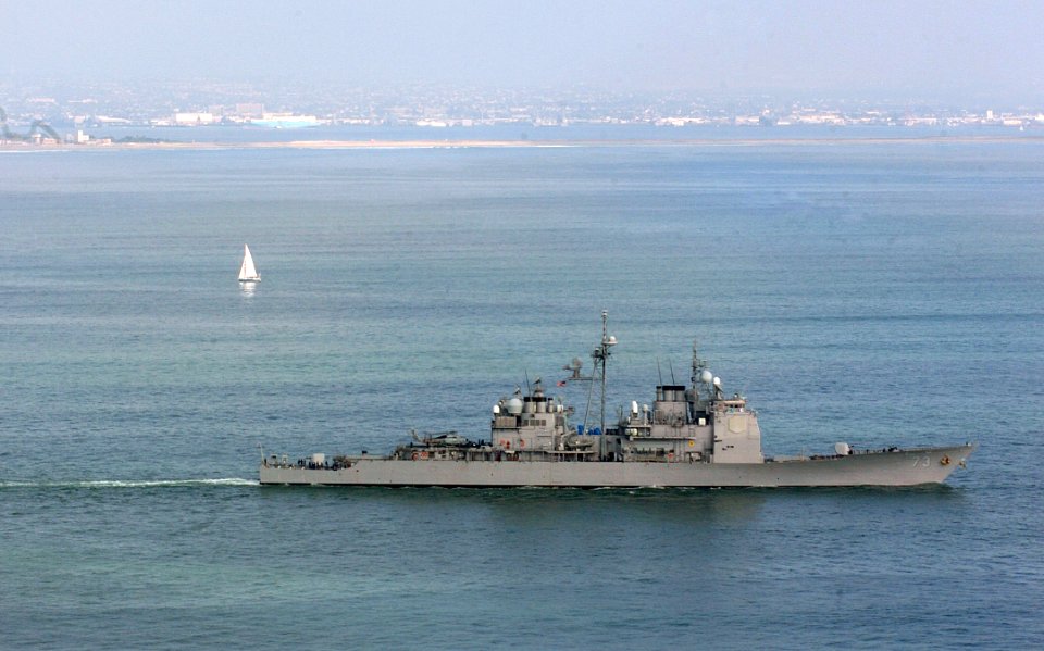 US Navy 060113-N-9866B-013 An aerial view of the guided missile cruiser USS Port Royal (CG 73) as it heads out of its homeport of Naval Station San Diego