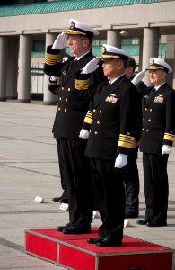 US Navy 060116-N-9851B-003 Chief of Naval Operations, Adm. Mike Mullen, and Japan Maritime Self Defense Force Chief of Staff, Adm. Takashi Saito salute as the anthems of the U.S. and Japan are played