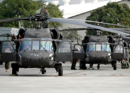 US Navy 060117-N-3019M-003 U.S. Army UH-60 Blackhawk helicopters prepare to take off from Fleet Industrial and Supply Center