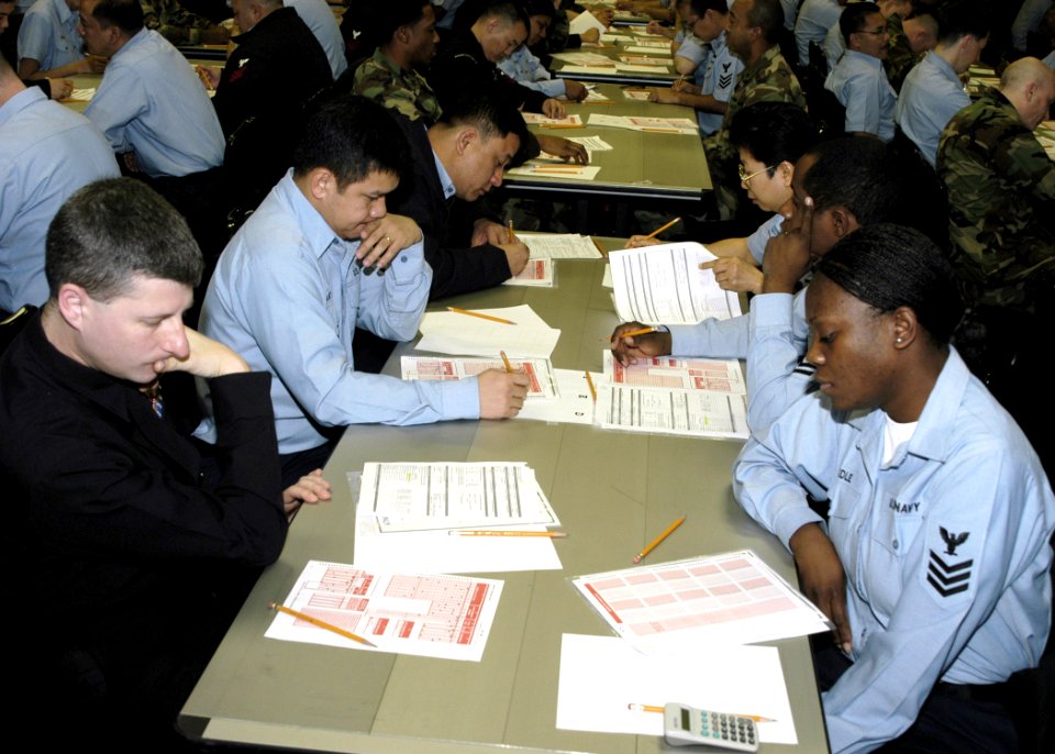 US Navy 060119-N-2385R-036 Sailors review their answer sheets prior to taking the Chief Petty Officers' (CPO) exam