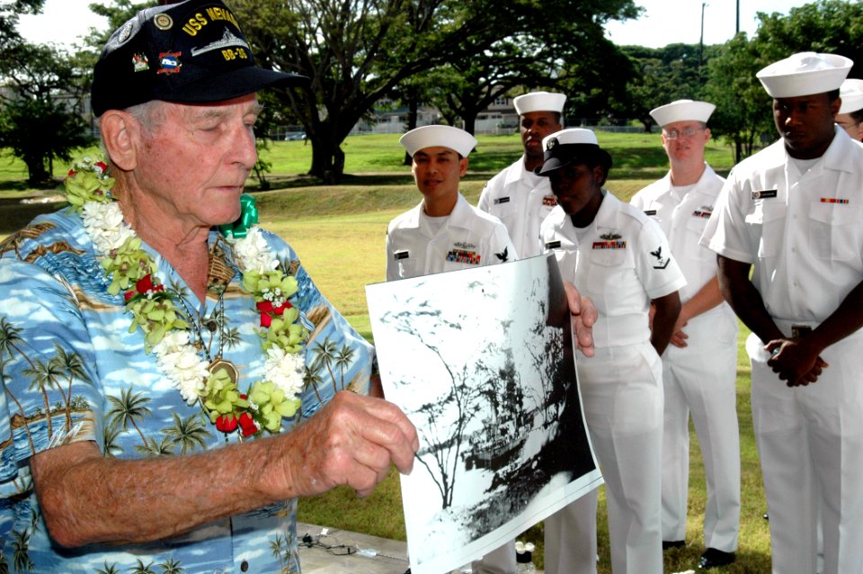 US Navy 051213-N-3019M-001 Pearl Harbor survivor Woody Derby, stationed aboard the battleship USS Nevada (BB 36) during the Dec. 7, 1941 attack, recounts his experiences to Sailors