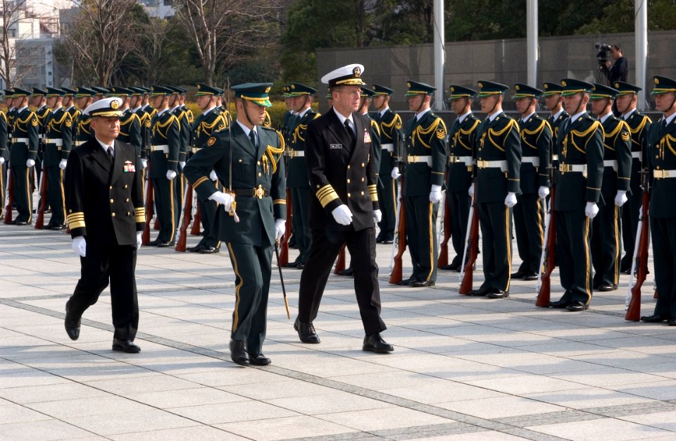 US Navy 060116-N-9851B-006 A member of Japan's Ground Self Defense Force Special Honor Guard escorts the United States Chief of Naval Operations, Adm. Mike Mullen, and Japan Maritime Self-Defense Force Chief of Staff, Adm. Take