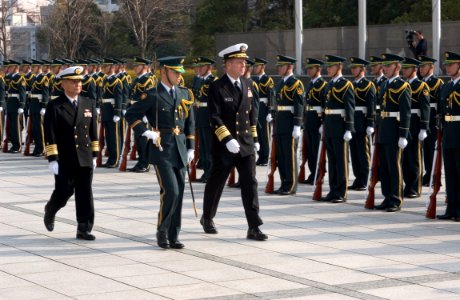 US Navy 060116-N-9851B-006 A member of Japan's Ground Self Defense Force Special Honor Guard escorts the United States Chief of Naval Operations, Adm. Mike Mullen, and Japan Maritime Self-Defense Force Chief of Staff, Adm. Take