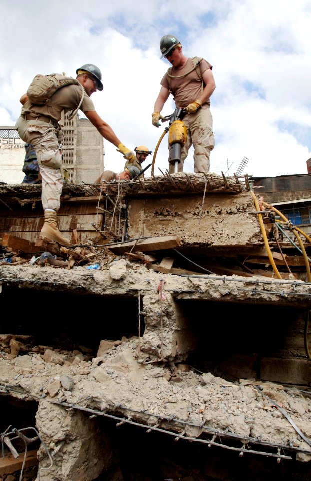 US Navy 060125-F-2902B-100 U.S. Navy Seabees remove debris from a building that collapsed on Nairobi's Ronald Ngala Street Kenya, Africa, Jan. 24, 2006