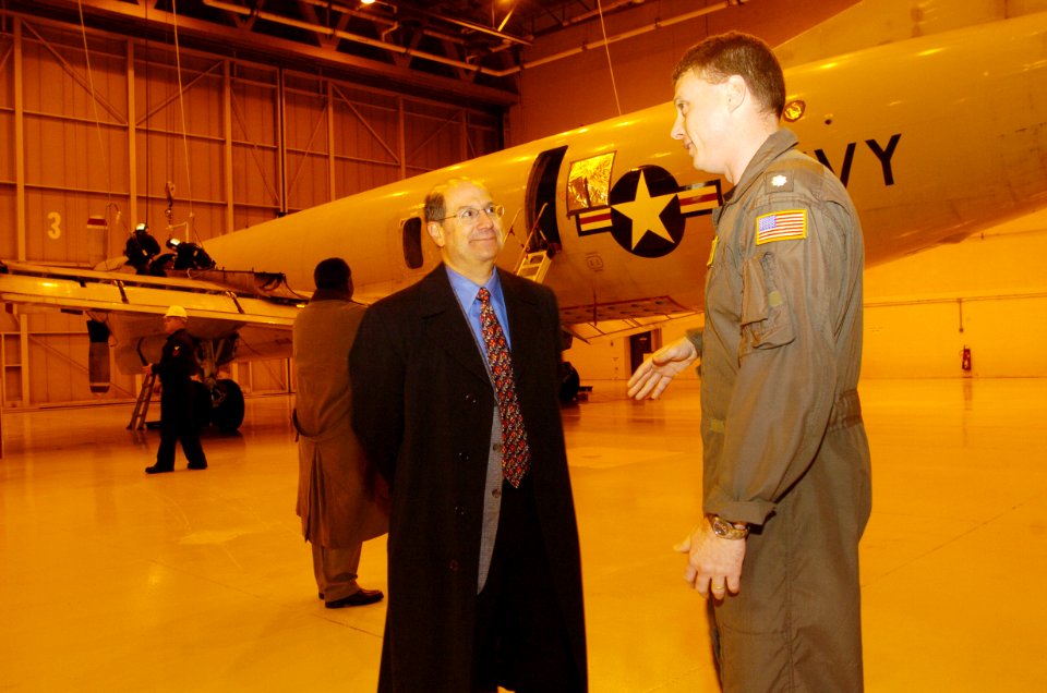 US Navy 060120-N-2568S-022 Commanding Officer Patrol Squadron Eight (VP-8), Cmdr. Mike Napolitano, explains the various missions of a P-3 squadron to Secretary of the Navy (SECNAV), the Honorable Dr. Donald C. Winter