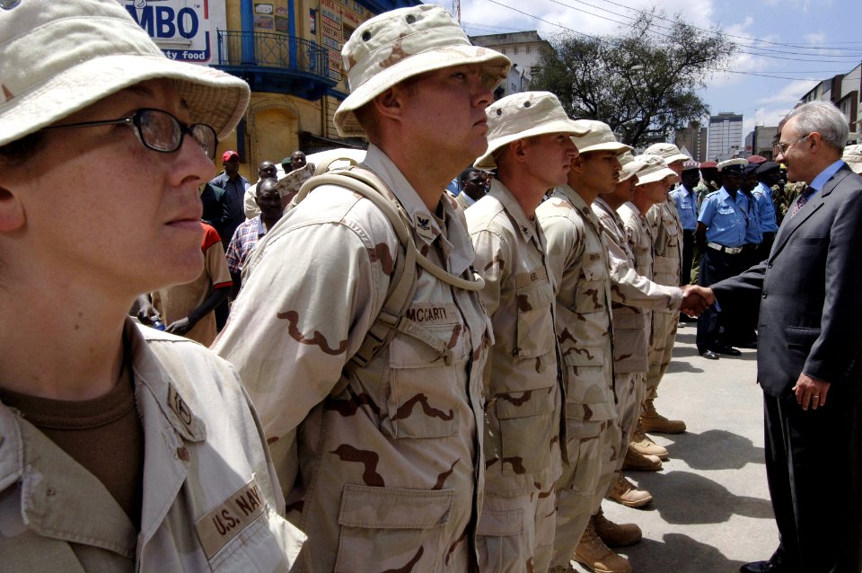 US Navy 060126-F-2902B-192 The U.S. Ambassador to Kenya, William Bellamy, shows his appreciation for the U.S. Navy Seabees' hard work after a memorial ceremony for those killed in a building that collapsed