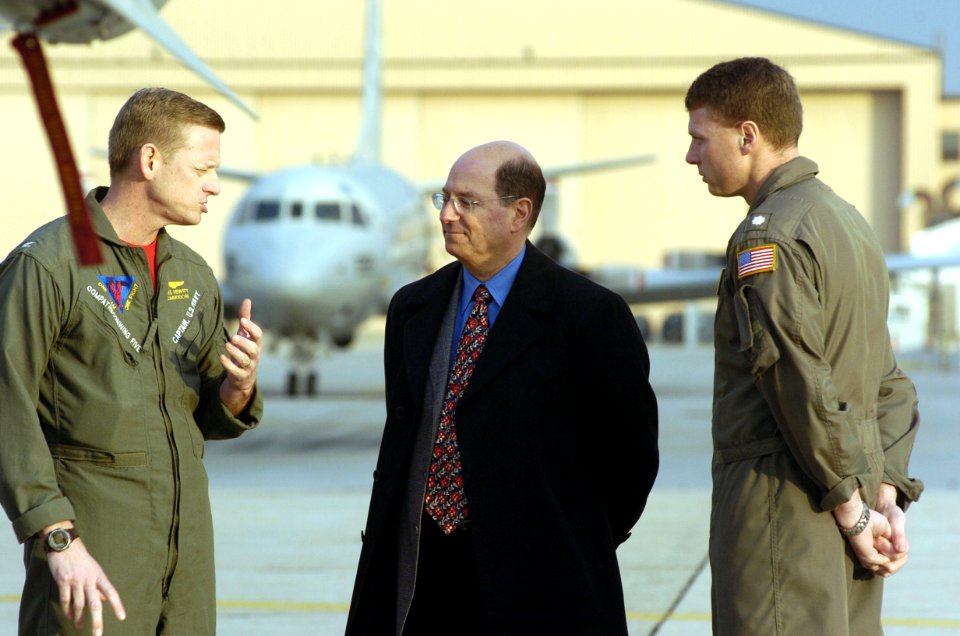 US Navy 060120-N-2568S-045 Commodore Patrol and Reconnaissance Wing Five (VPU-5), Capt. Mike Hewitt, left, Commanding Officer Patrol Squadron Eight (VP-8), Cmdr. Mike Napolitano, discusses the various missions of a P-3 squadron