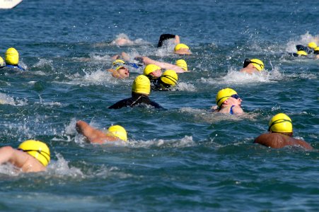 US Navy 060209-N-9698C-029 Sailors and civilians swim out into San Diego Bay during the 12th Annual Polar Bear Swim sponsored by Morale, Welfare and Recreation (MWR), Naval Submarine Base Point Loma