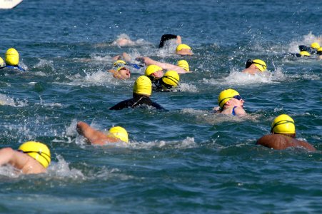 US Navy 060209-N-9698C-029 Sailors and civilians swim out into San Diego Bay during the 12th Annual Polar Bear Swim sponsored by Morale, Welfare and Recreation (MWR), Naval Submarine Base Point Loma photo