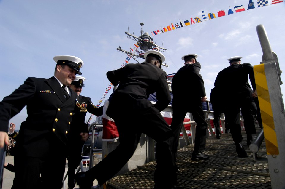 US Navy 060128-N-5328N-049 Sailors assigned the guided missile destroyer USS Forrest Sherman (DDG 98) man the ship