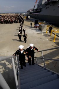 US Navy 060128-N-5328N-030 Sailors assigned the guided missile destroyer USS Forrest Sherman (DDG 98) man the ship