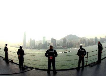 US Navy 060216-N-7526R-173 Sailors assigned to the amphibious command ship USS Blue Ridge (LCC 19) man the rails as the ship arrives into Hong Kong bay