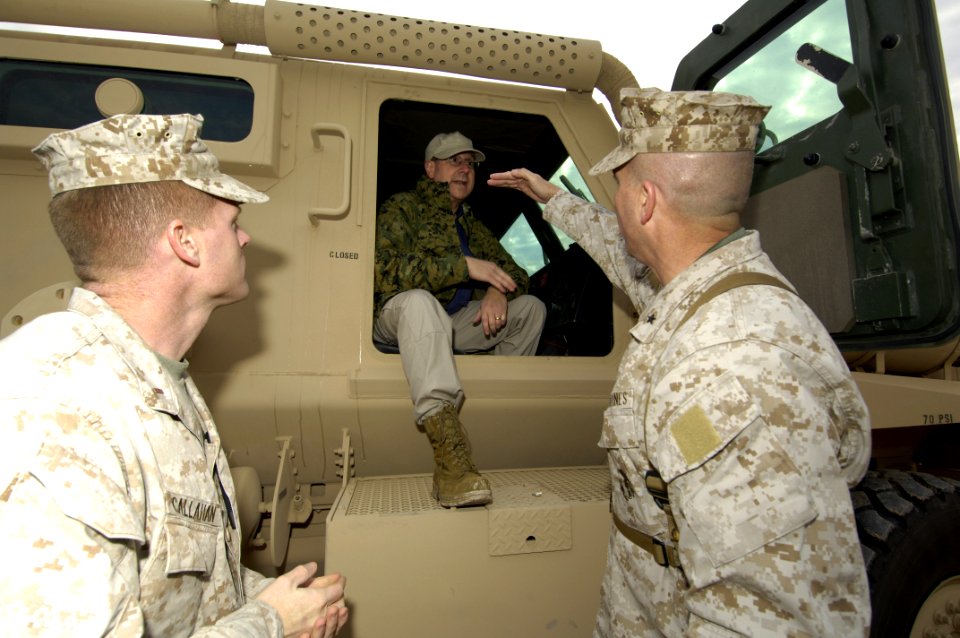 US Navy 060128-N-2568S-027 Brig. Gen. John Wissler (right) and Chief Warrant Officer Tim Callahan explain to Secretary of the Navy (SECNAV) Dr. Donald C. Winter, how the newly designed vehicles are helping to protect Marines