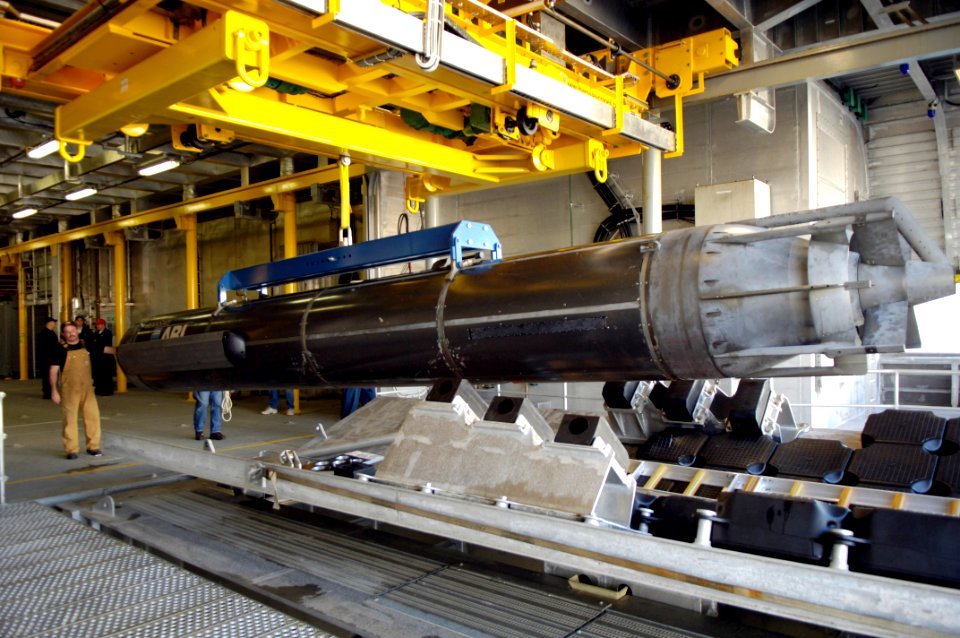 US Navy 060131-N-7676W-026 he Seahorse-class Autonomous Underwater Vehicle (AUV) is maneuvered into position in Sea Fighter's (FSF-1) mission bay during launch and recovery testing